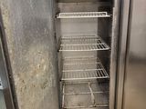 an image of an open refrigerator in a kitchen