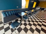 a black and white checkered floor in a restaurant