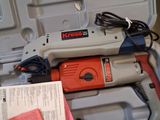 a tool in a tool case with other tools in it