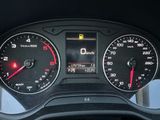 a close up of a car dashboard with various gauges