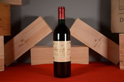 a bottle of wine that is sitting on a table