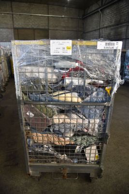 a metal cage filled with assorted items in a warehouse