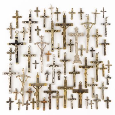 an image of a bunch of crosses that are on a wall