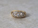 an image of a diamond ring sitting on a table