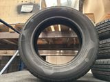 tires are stacked on top of each other in a warehouse