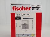 a box of fischer tape on a white surface
