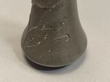 a gray vase with a picture of a man on it