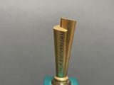 a gold trophy on a blue pedestal on a gray background