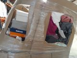 a man that is inside of a cardboard box