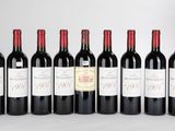 six bouteilles de vin rouge alignées