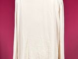 an image of a white shirt on a mannequin stand