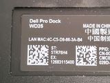 a close up of a computer keyboard with a qr code on it