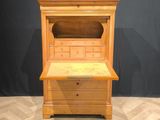 an old wooden desk with a drawer on top of it