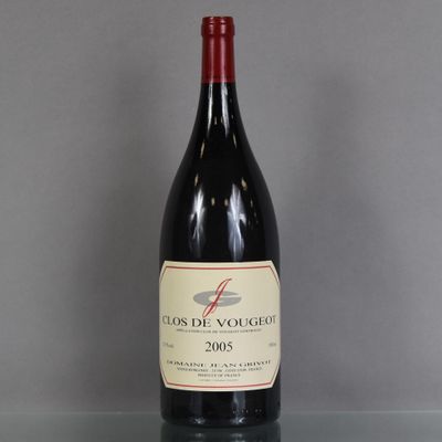 a bottle of wine that is sitting on a table