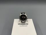 seiko watch on display in a white box on a gray surface