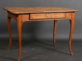 an old wooden table with a drawer on top of it