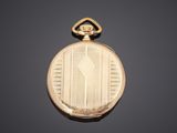 an image of a gold pocket watch on a black background