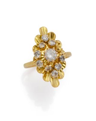 a diamond cluster ring, by van cleef