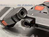 a close up of a toy gun on a table