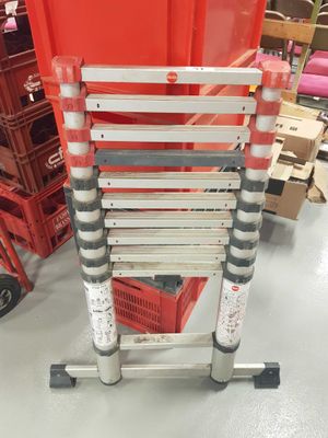 a ladder that is sitting on the floor in a store