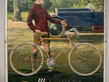 tableau représentant un homme à vélo tenant un ballon de football dans la main