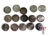 an image of a group of coins sitting on top of a white surface
