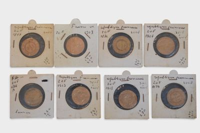 six different types of coins are shown on a piece of paper