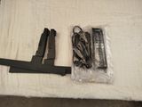 two remotes and a remote control on a table