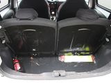 two seats in the back of a small car