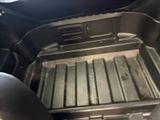 a grill in the back of a car with a grill in it