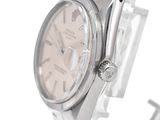 an image of a close up of a wrist watch on a white background