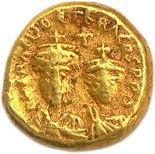 une pièce d'or à l'effigie d'une femme