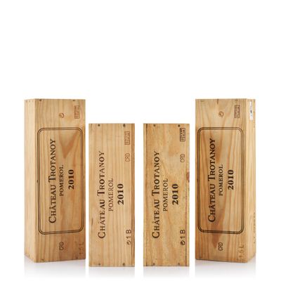 three wooden boxes with different types of wine on them
