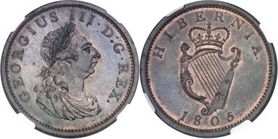 a close up of a coin with a crown on it