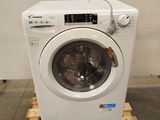 a washing machine sitting on a pallet in a room
