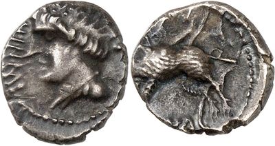 a silver coin with an image of a man on it