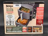 boxed box of ninja double stacker with chicken and vegetables in it