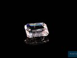 a close up of a diamond on a black surface
