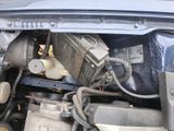 a picture of a car engine that is under the hood