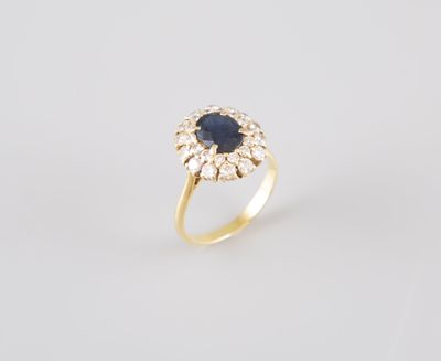 une bague à grappes de saphirs et de diamants