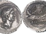 a close up of a silver coin with a man on it