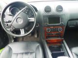 a picture of a car dashboard with a steering wheel