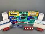 a lot of toy trains that are sitting on a table