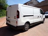a white van parked on the side of the road