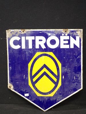 un panneau bleu et jaune sur lequel est inscrit « Citroën »