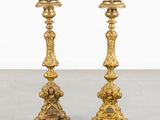 pair of antique brass candlesticks in the style of louis ii