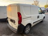 a white van that is parked in a parking lot