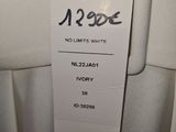 the label is attached to a white dress hanging on a hanger