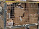 a cart full of boxes and bags on the street