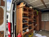 a van that has a bunch of tools in it
